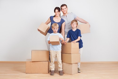Measured boxes and furniture showing cubic-yard pricing