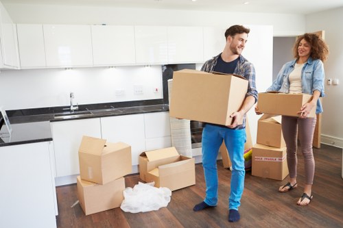 Packed boxes and furniture prepared for short-term storage in Hendon